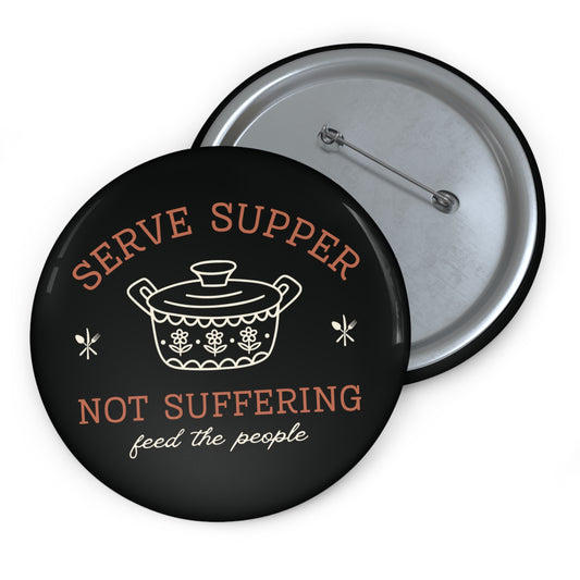 Black button with orange and white 'Serve supper, not suffering' text and white vintage pyrex pot illustration 