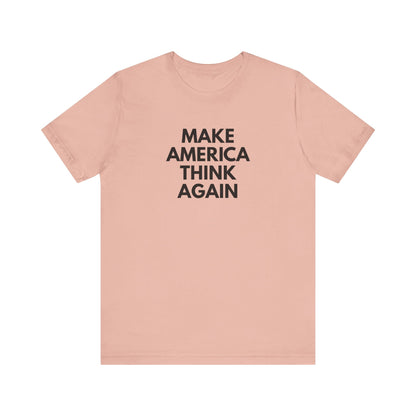 Peach t-shirt with 'MAKE AMERICA THINK AGAIN' black text