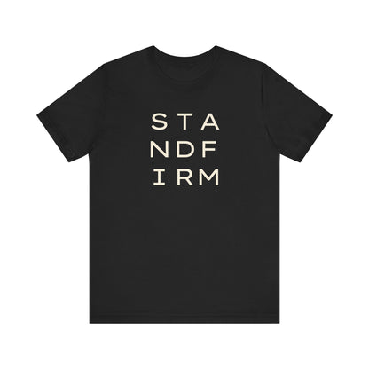 Black t-shirt with cream 'STAND FIRM' text 