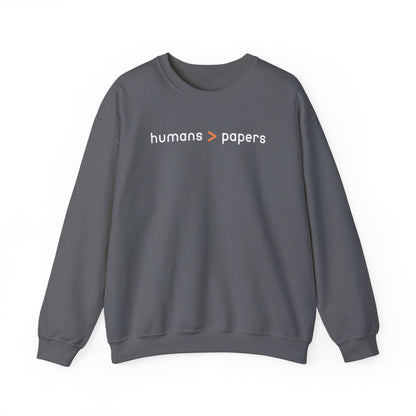 Gray unisex crewneck sweatshirt with 'humans > papers' white text
