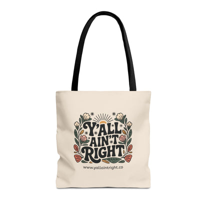 Cream tote bag with black handles with 'Y'all Ain't Right' graphic design