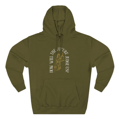 Green hoodie with gold Lady Liberty sketch graphic and "how will the future judge us?" white text