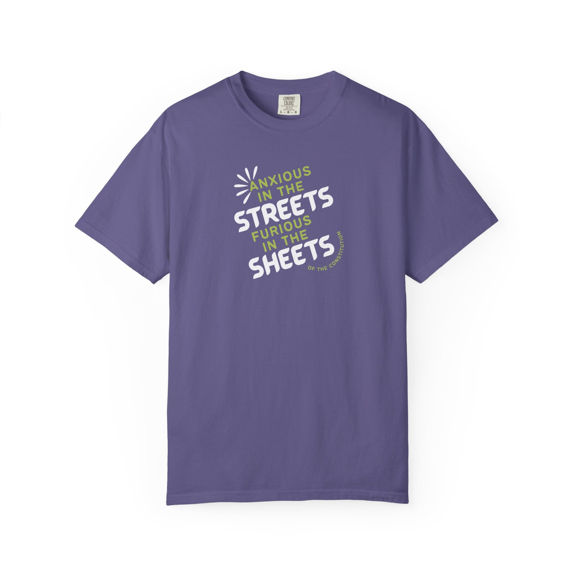 Purple t-shirt with white and lime green text "anxious in the streets furious in the sheets (of the constitution)"
