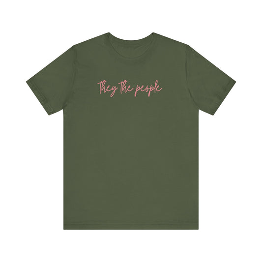 Military green t-shirt with 'they the people' text in pink