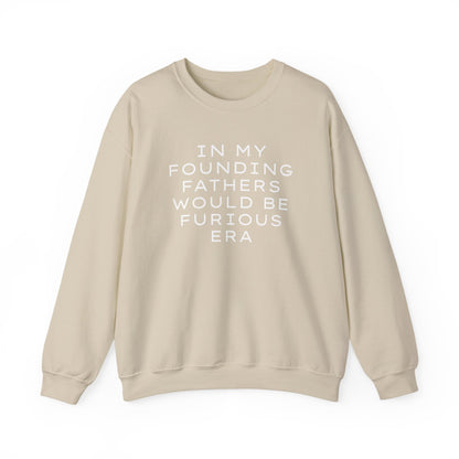 Tan unisex crewneck sweatshirt with “In my founding fathers would be furious era” text in white