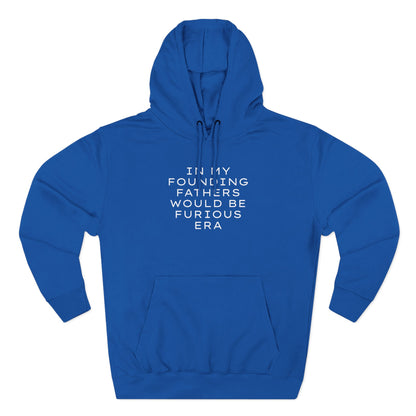 Royal blue hoodie with "in my founding fathers would be furious era" cream text