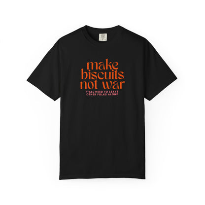 Black t-shirt with orange text 'make biscuits not war' with smaller pink text "y'all need to leave other folks alone" 