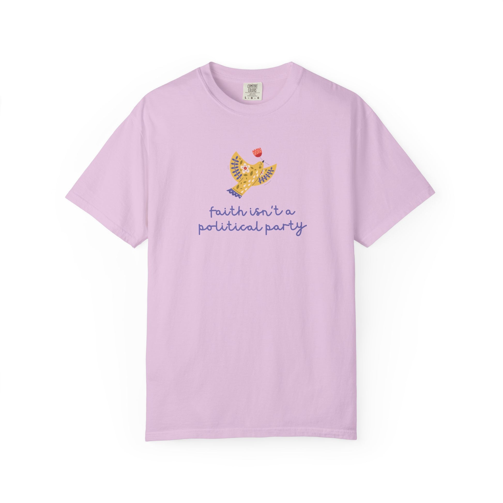 Light purple t-shirt with a folk art dove graphic and purple text "faith isn't a political party"