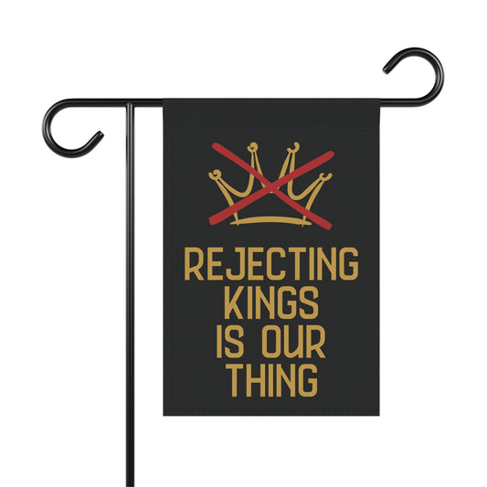Black garden flag with gold crown with red X over it and gold text 'REJECTING KINGS IS OUR THING'