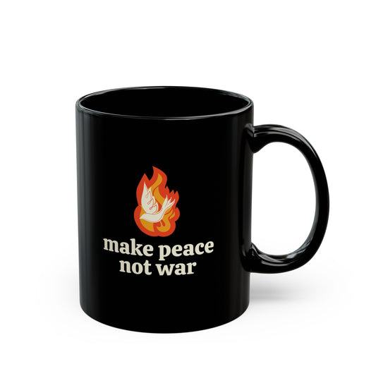 Black 11 oz mug with white dove over orange flame illustrated graphic and cream text 'make peace not war' design 