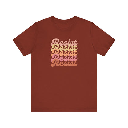 Rust t-shirt with 'Resist' in gradient colors in retro text