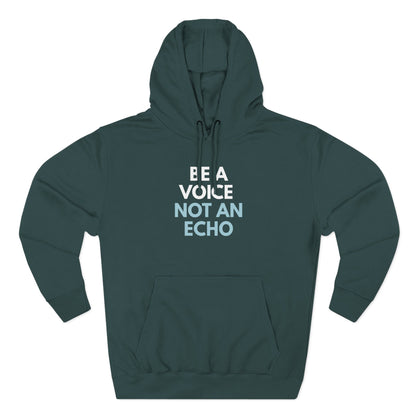 Green hoodie with 'Be a Voice Not an Echo' white and light blue text