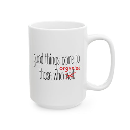 White ceramic 15 oz coffee or tea mug with 'good things come to those who organize' black and red text