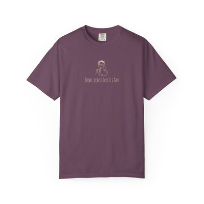 Plum purple unisex Comfort Colors t-shirt with Jesus sketch graphic and "brown, broke & born in a barn" in cream text