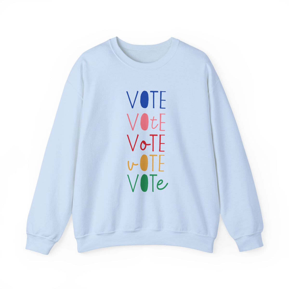 A light blue crewneck sweatshirt featuring a vertical graphic print of the word 'VOTE' repeated five times in alternating colors: blue, pink, red, yellow, and green.