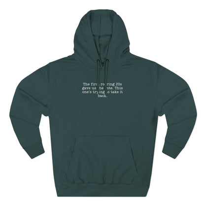 Teal green hoodie with cream text "the first roaring 20s gave us the vote. this one's trying to take it back."