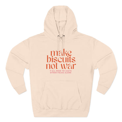 Light pink hoodie with orange text 'make biscuits not war' with smaller pink text "y'all need to leave other folks alone"