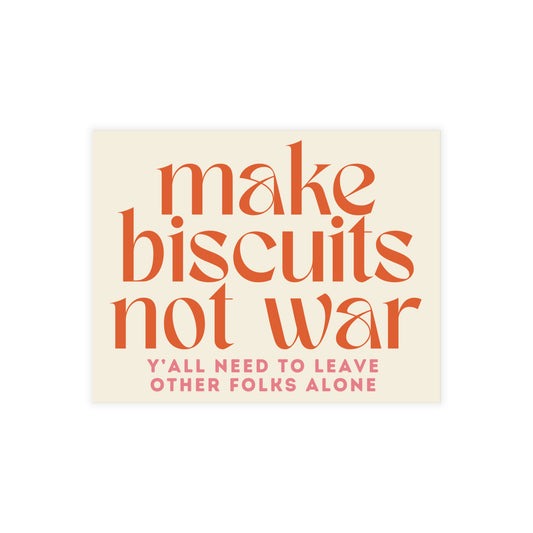 Beige postcard with orange text 'make biscuits not war' and smaller pink text Y'all need to leave other folks alone'
