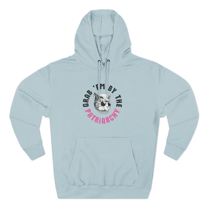 Light blue hoodie with a punk rock cat graphic and text "grab 'em by the patriarchy" in black and pink