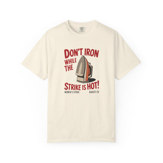 Beige unisex Comfort Colors t-shirt  with "don't iron while the strike is hot" red text and a vintage iron graphic