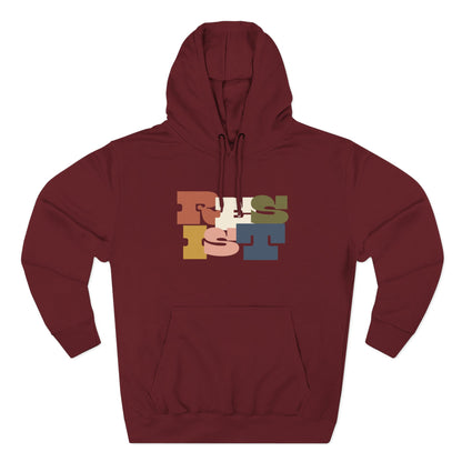 Maroon hoodie with colorful "RESIST" text