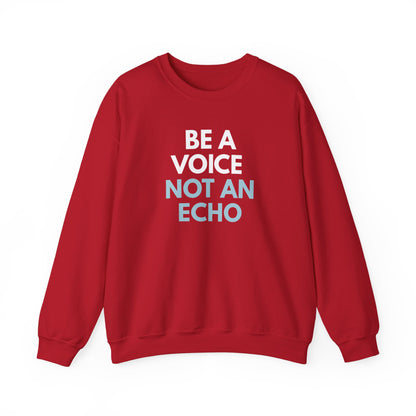 Red unisex crewneck sweatshirt with 'Be a Voice Not an Echo' white and blue text