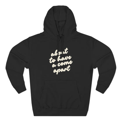 Black hoodie with "about to have a come apart" in cream text