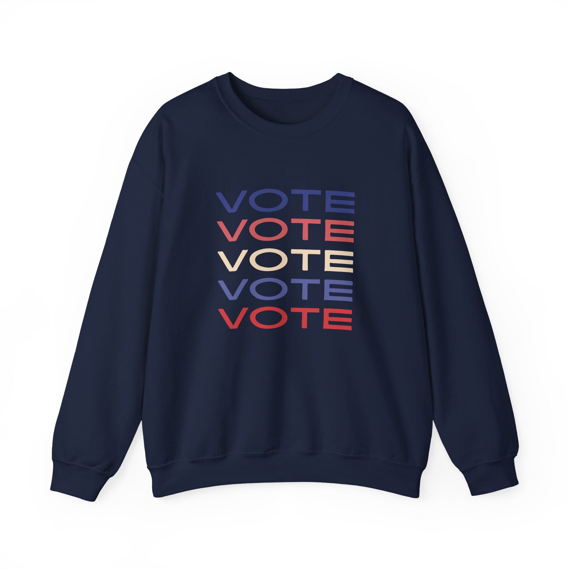 A navy blue crewneck sweatshirt featuring a stacked graphic print of the word 'VOTE' in blue, red, and beige, displayed on a clean white background.