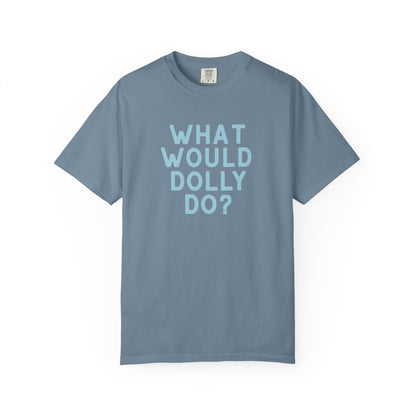 A blue short-sleeve crewneck t-shirt with the text 'WHAT WOULD DOLLY DO?' printed in a matching light blue font on the front, displayed against a clean white background.