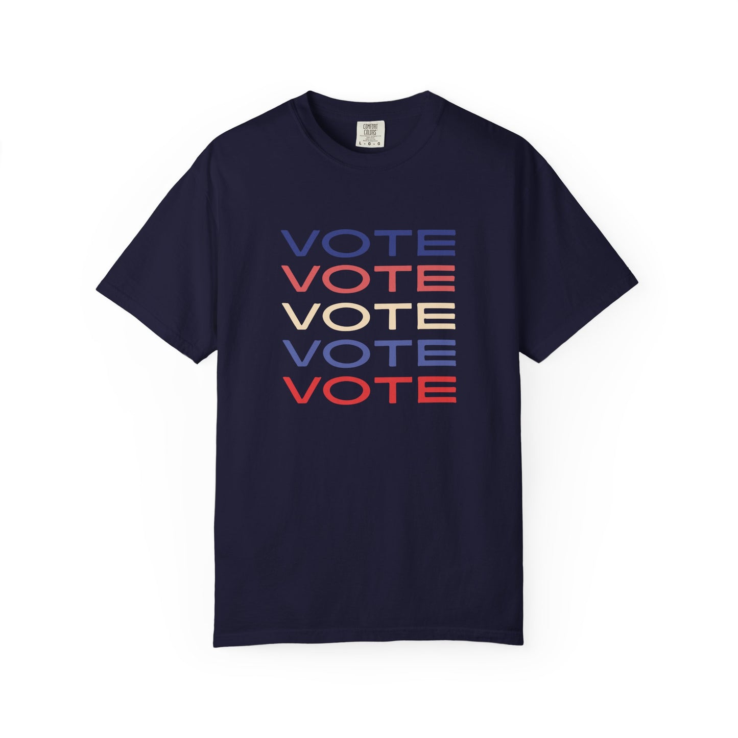 A navy blue short-sleeve crewneck t-shirt featuring a stacked graphic print of the word 'VOTE' in blue, red, and beige, displayed on a clean white background.