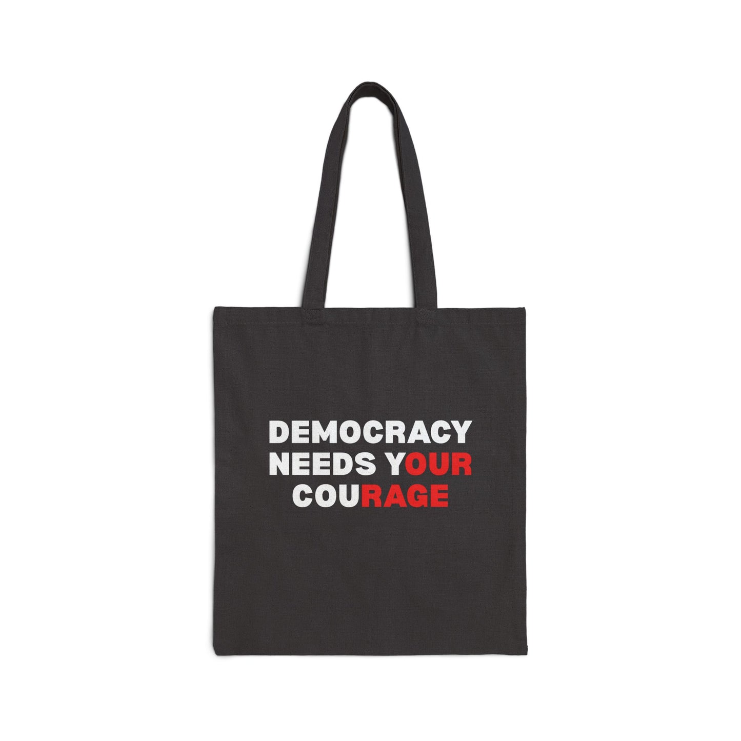 Black canvas tote bag with 'DEMOCRACY NEEDS YOUR COURAGE' white and red text