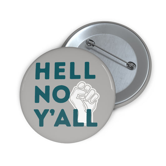 Gray pin button with 'HELL NO Y'ALL' text and a raised fist symbol