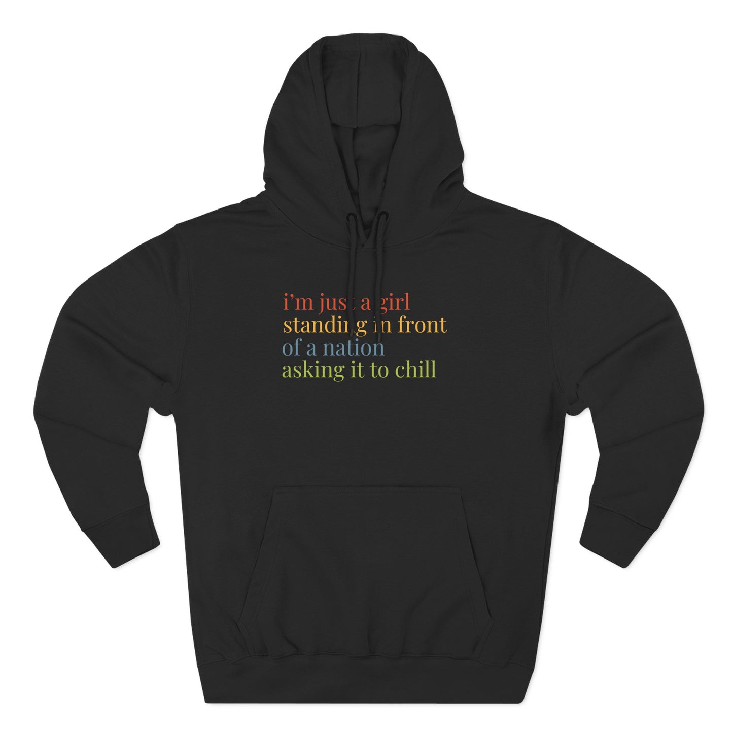 Black hoodie with colorful text "i'm just a girl standing in front of a nation asking it to chill"