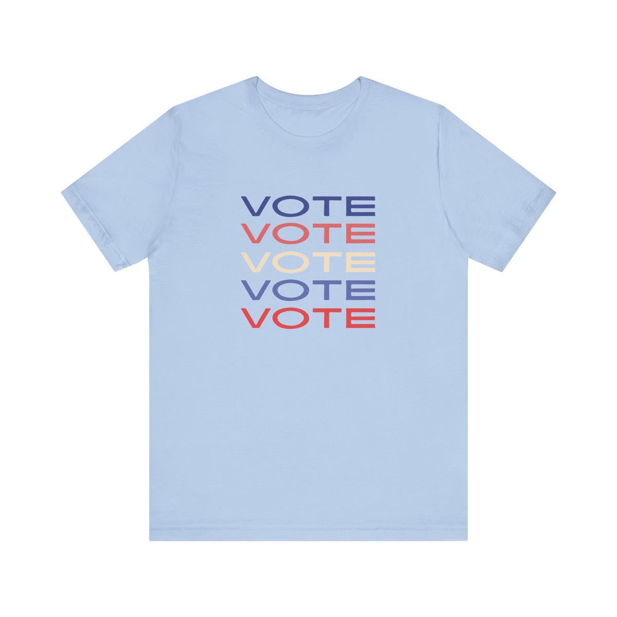 A light blue short-sleeve crewneck t-shirt featuring a stacked graphic print of the word 'VOTE' in blue, red, and cream on the chest.