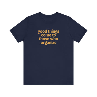 Navy blue t-shirt with gold text 'good things come to those who organize'