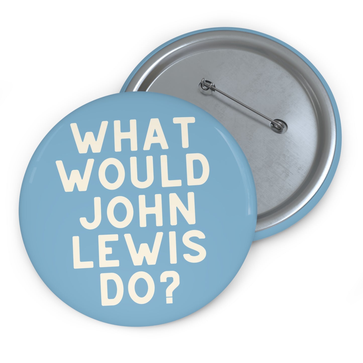 Light blue pin button with 'What Would John Lewis Do?' cream text