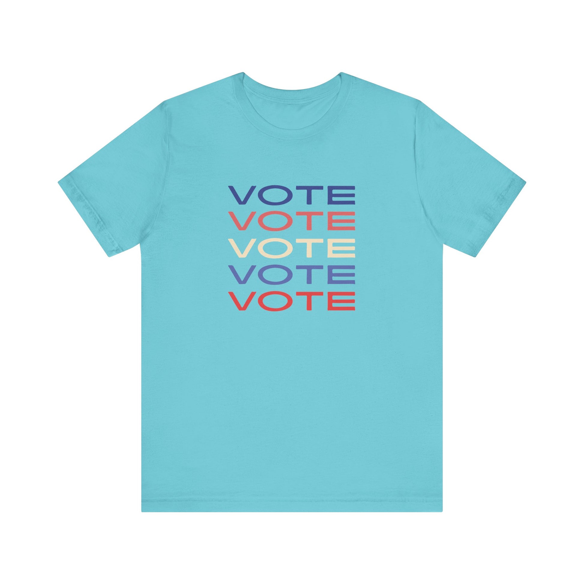 A turquoise short-sleeve crewneck t-shirt featuring a stacked graphic print of the word 'VOTE' in blue, red, and cream on the chest.