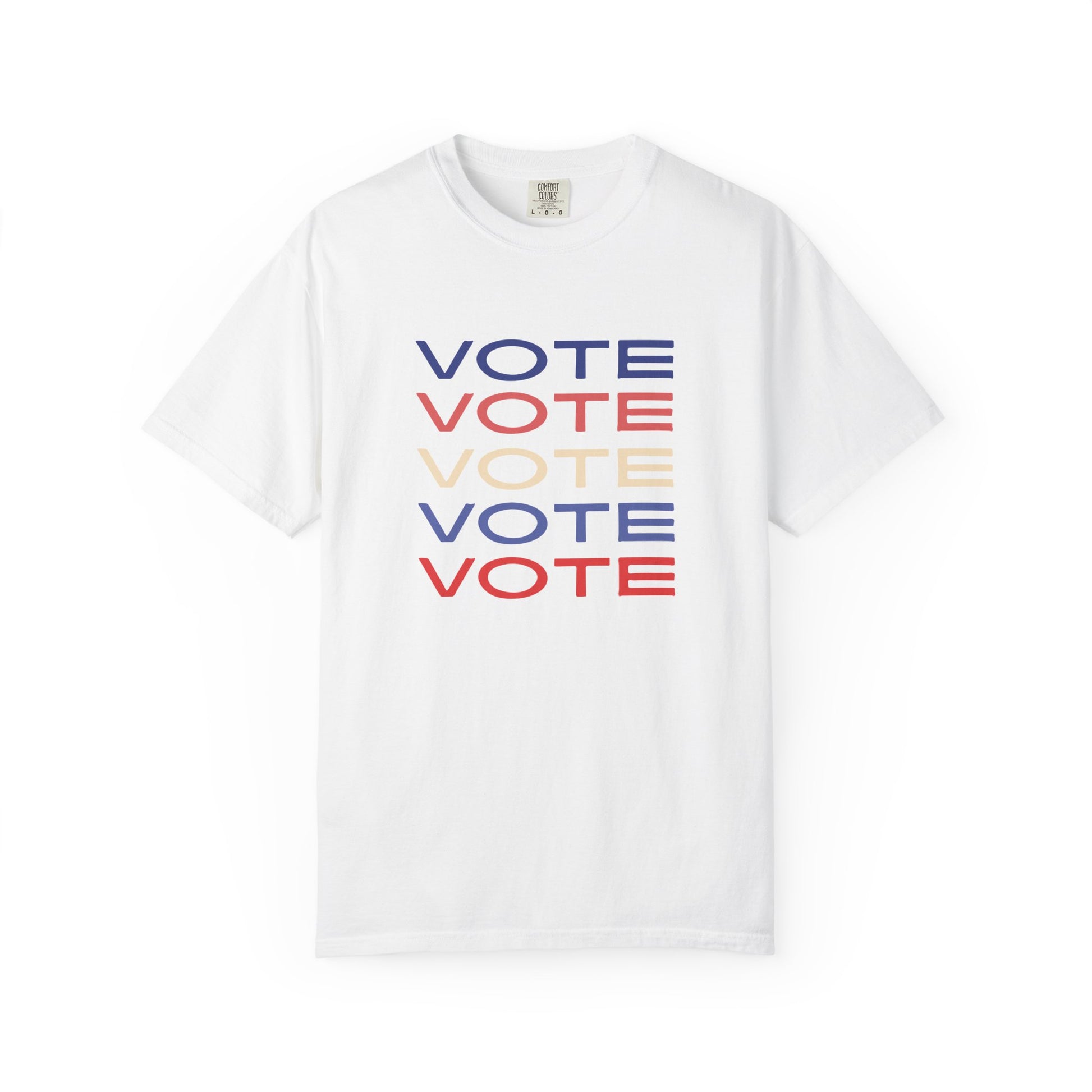 A white short-sleeve crewneck t-shirt featuring a stacked graphic print of the word 'VOTE' in blue, red, and beige, displayed on a clean white background.