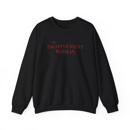 Black sweatshirt with red text "An Inconvenient Woman"
