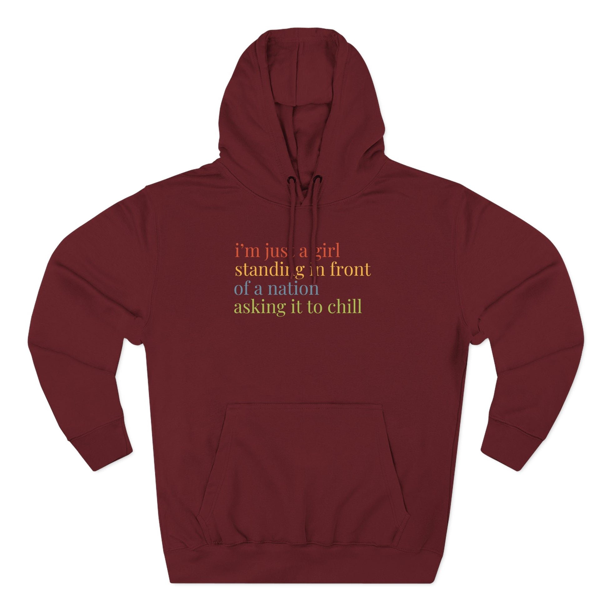 Maroon hoodie with colorful text "i'm just a girl standing in front of a nation asking it to chill"