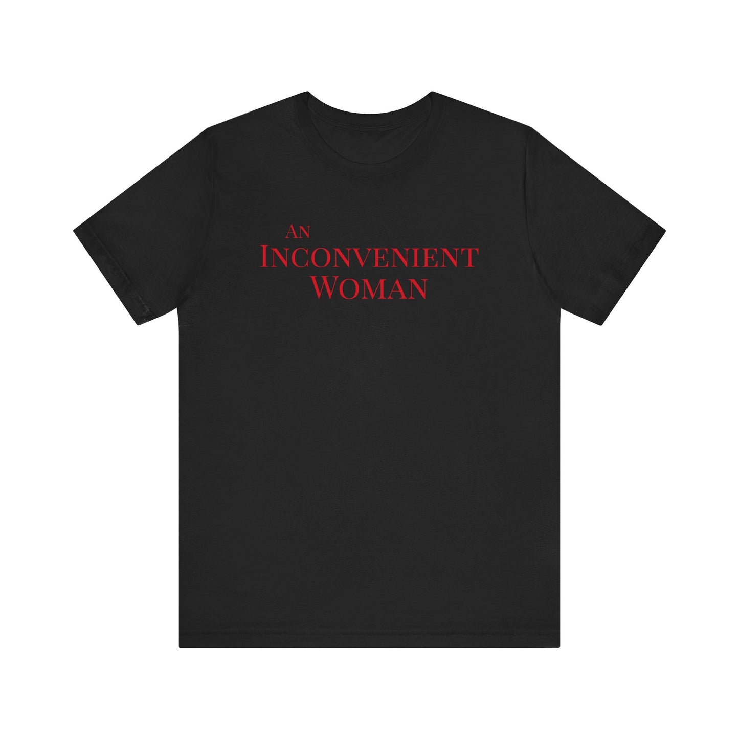 Black t-shirt with red text "An Inconvenient Woman"