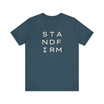 Dark teal t-shirt with cream 'STAND FIRM' text 