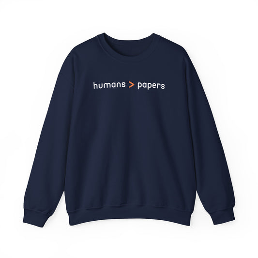 Navy blue unisex crewneck sweatshirt with 'humans > papers' white text