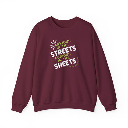Maroon unisex crewneck sweatshirt with "anxious in the streets, furious in the sheets (of the constitution)" lime green and white text