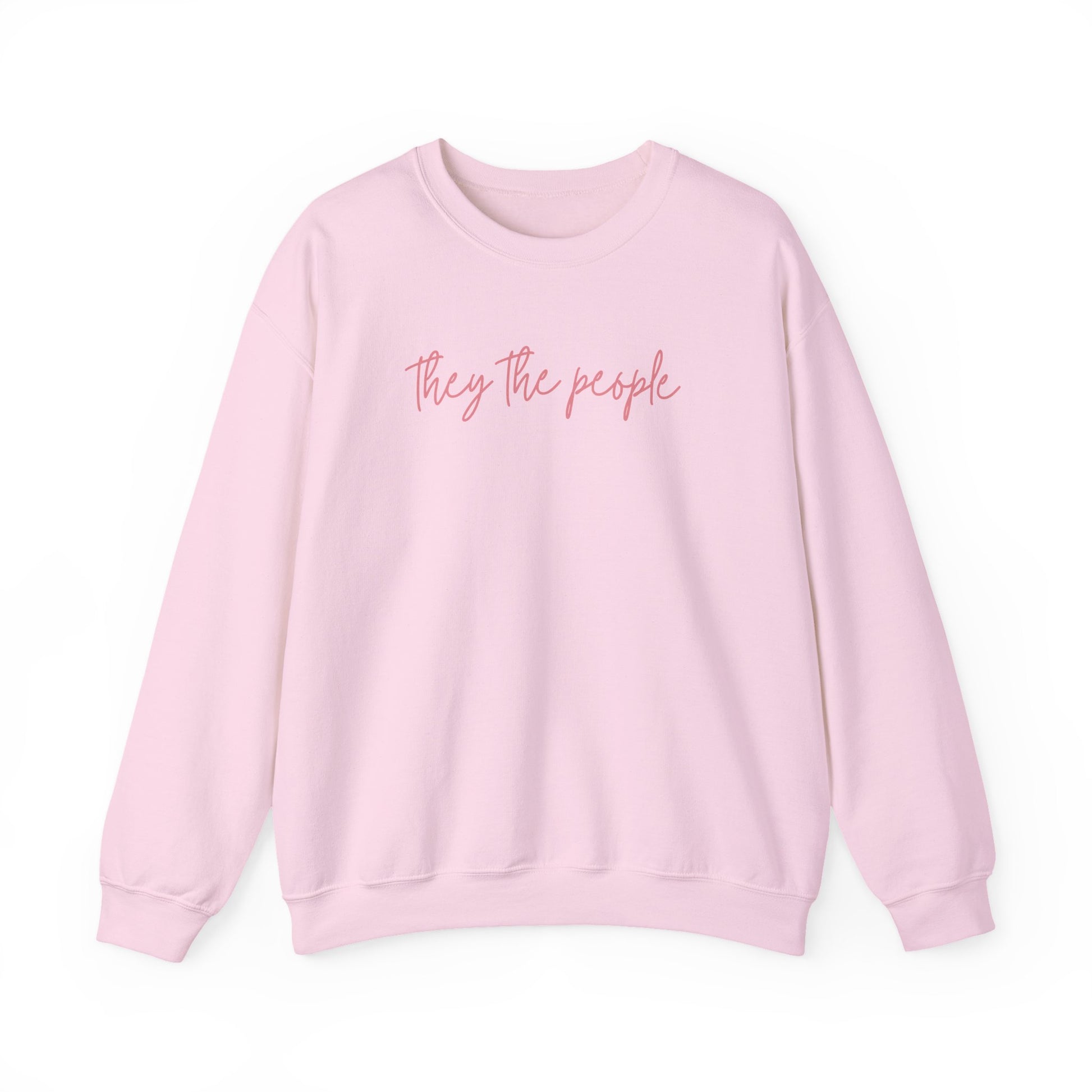 Light pink unisex crewneck sweatshirt with 'They the people' text in pink 