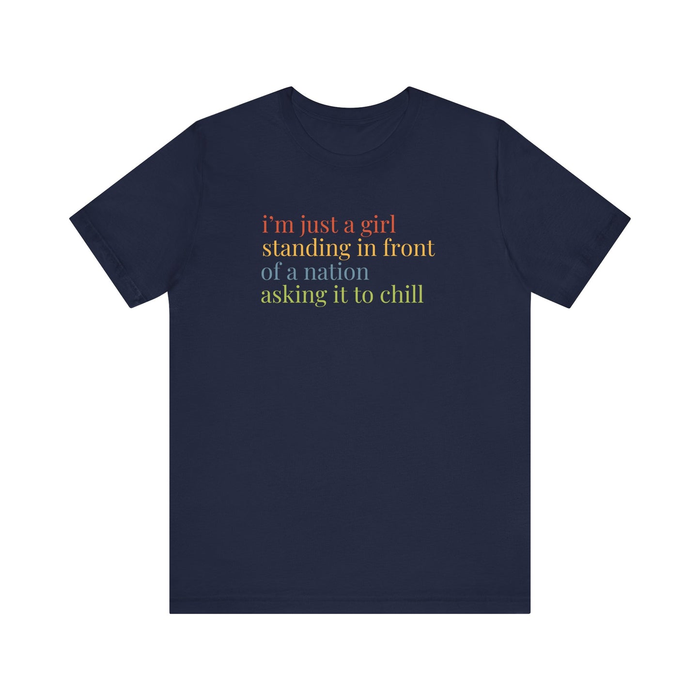 Navy blue t-shirt with colorful text "i'm just a girl, standing in front of a nation, asking it to chill"
