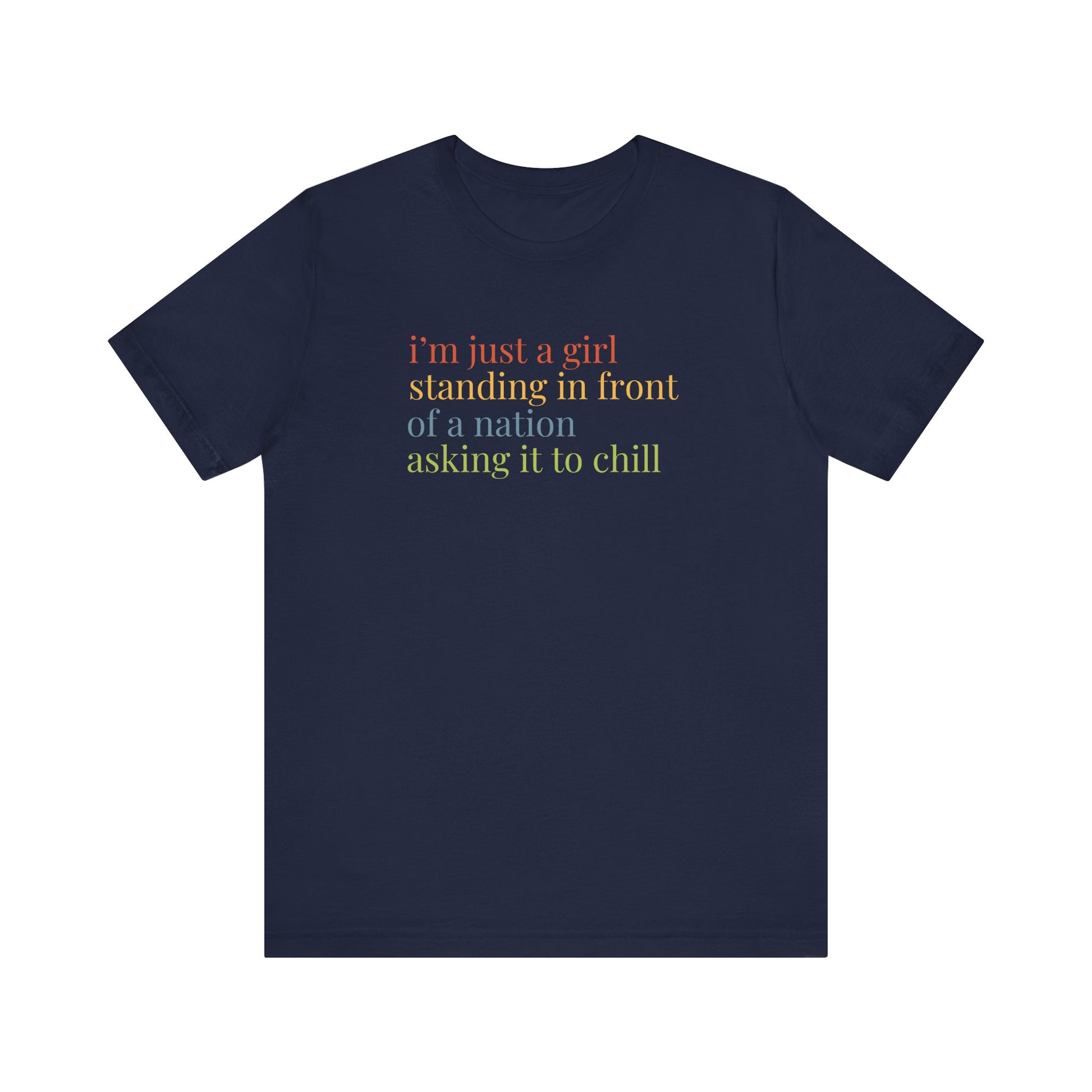 Navy blue t-shirt with colorful text "i'm just a girl, standing in front of a nation, asking it to chill"