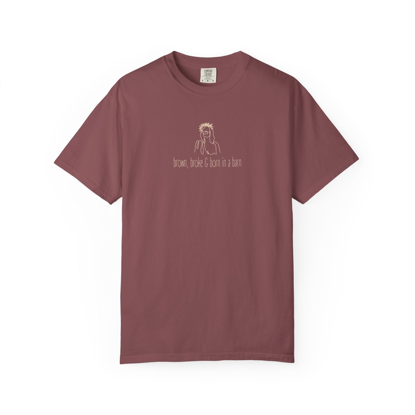 Mauve unisex Comfort Colors t-shirt with Jesus sketch graphic and "brown, broke & born in a barn" in cream text