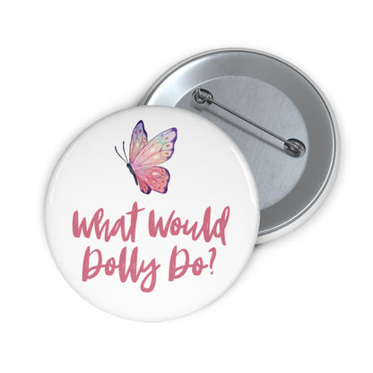 Two round pinback buttons shown on a white background. The front button is white with a pink butterfly graphic and the text 'What Would Dolly Do?' in pink script.