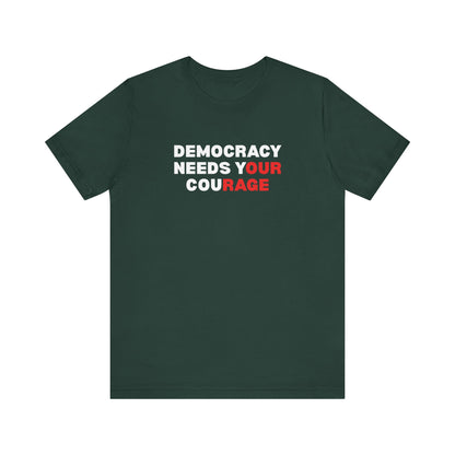Dark green t-shirt with text 'Democracy Needs Your Courage' in white and red